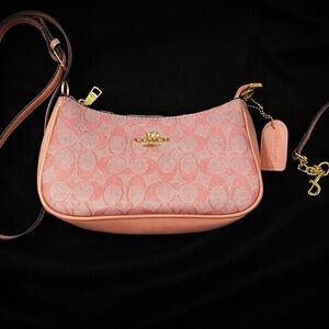 Coach Pink Crossbody Bag with Gold Accents